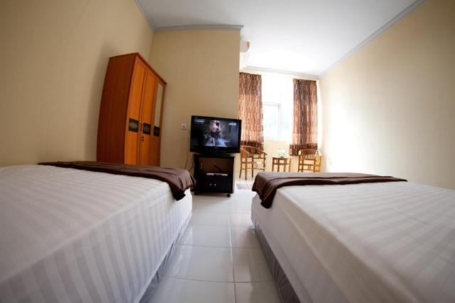 Hotel Lux Melati Tanjung Pandan Habitación foto